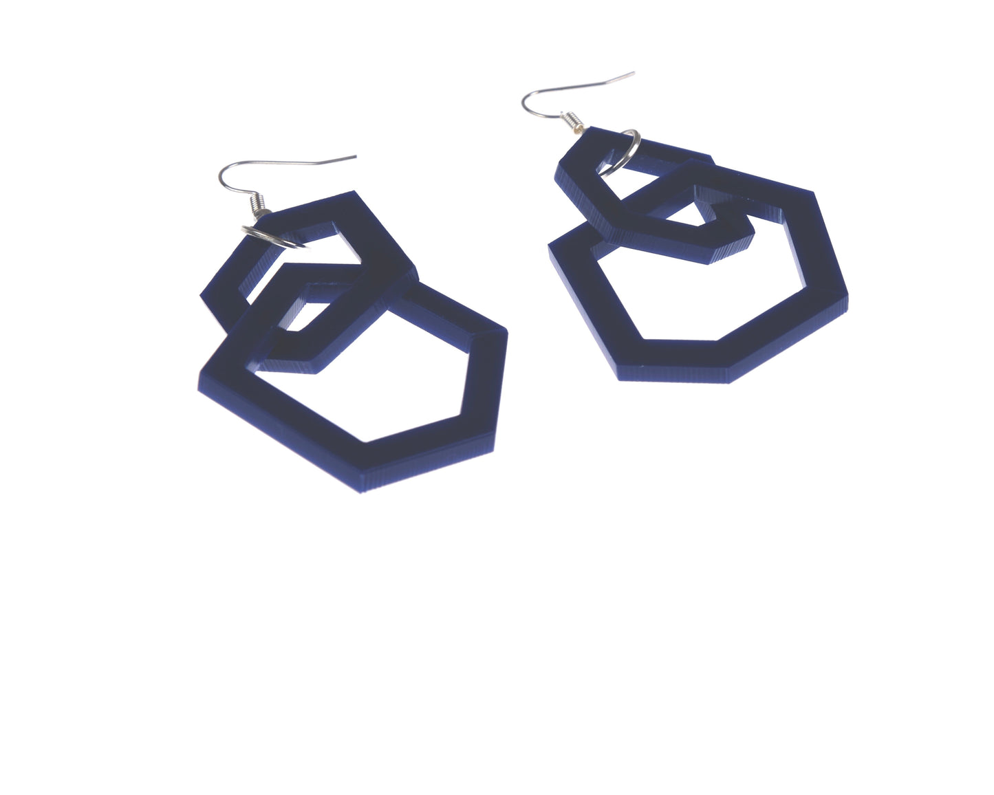 Navy blue geometric hoop earrings on a white background