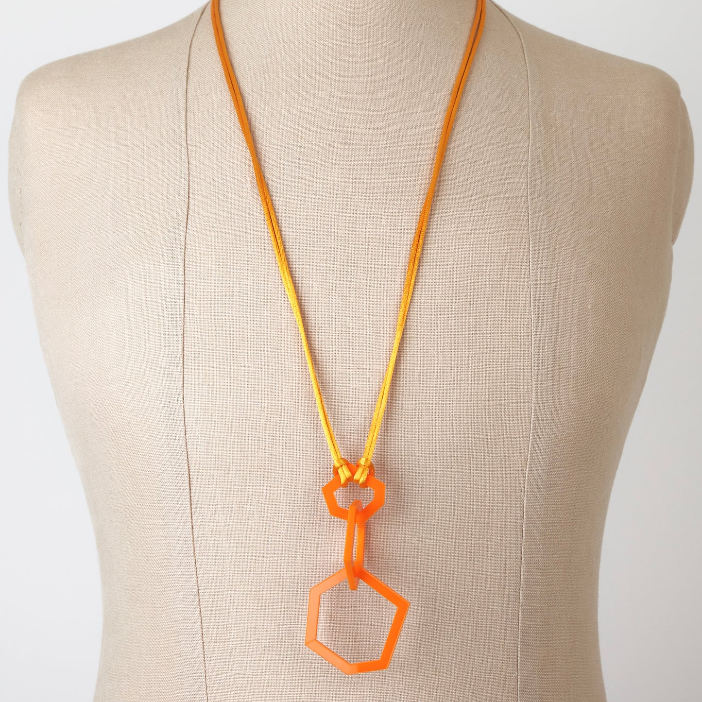 Orange Acrylic Hexagon Pendant Necklace.