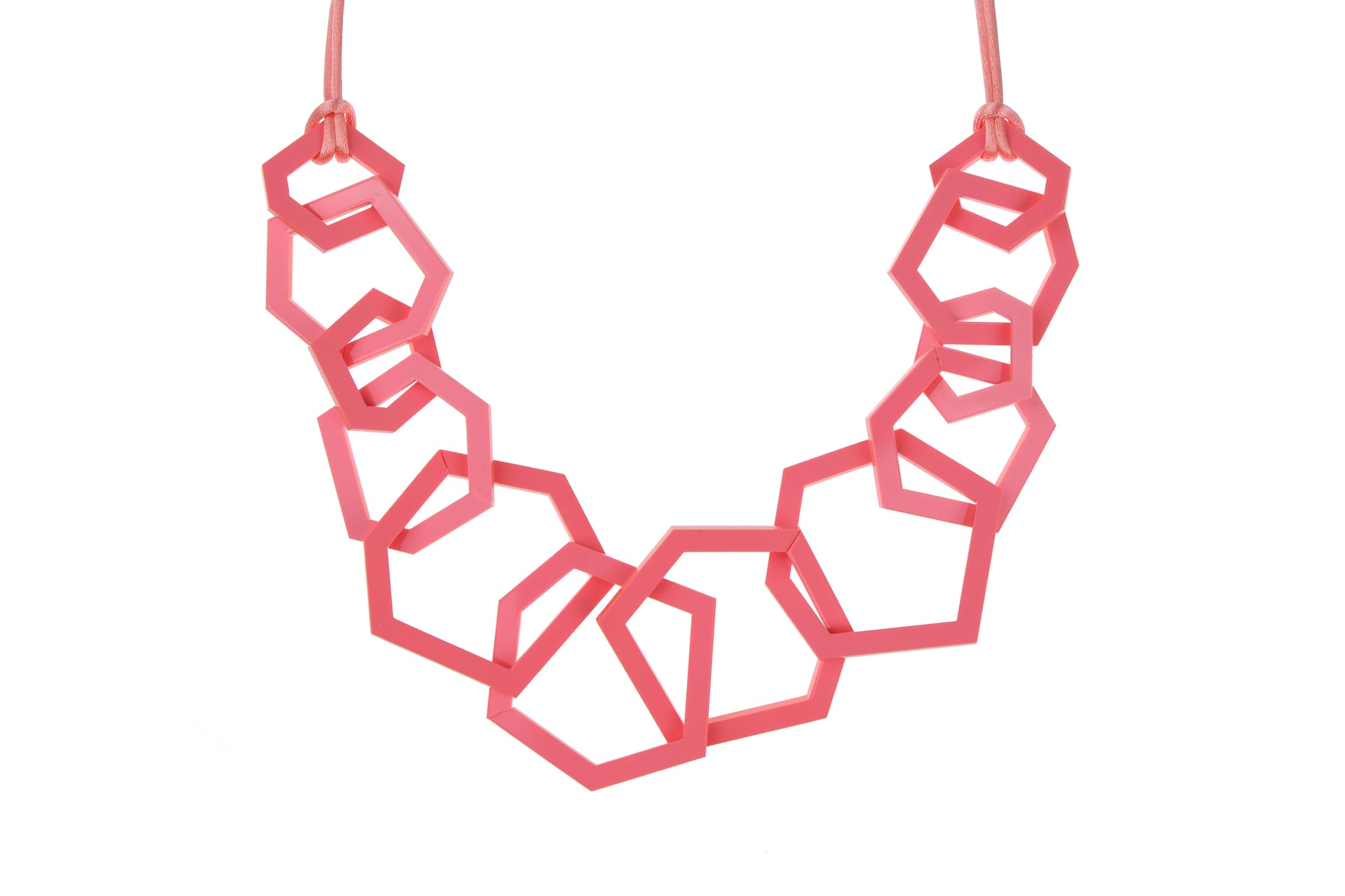 Geometric pink necklace on a white background