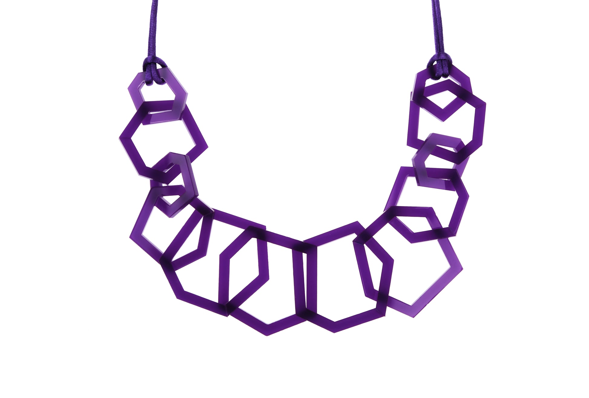 Purple geometric necklace on a white background