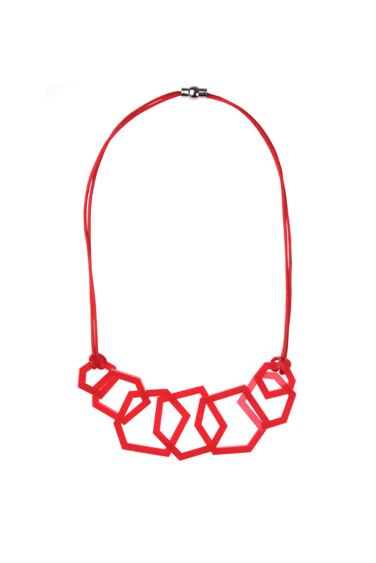 Red geometric necklace on a white background