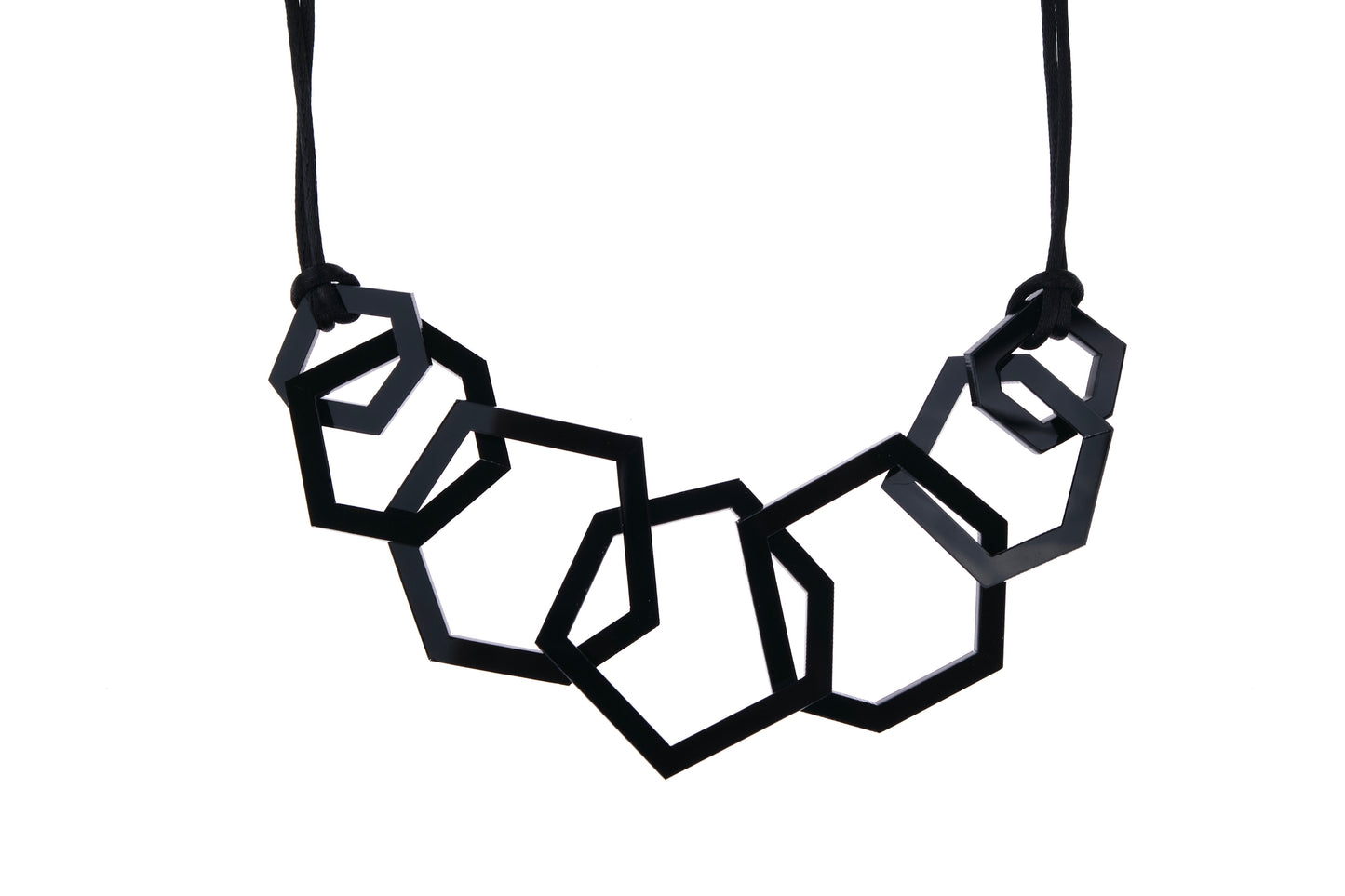 Black geometric necklace on a white background