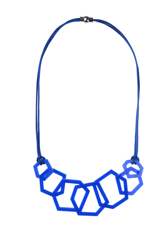 Blue geometric necklace on a white background