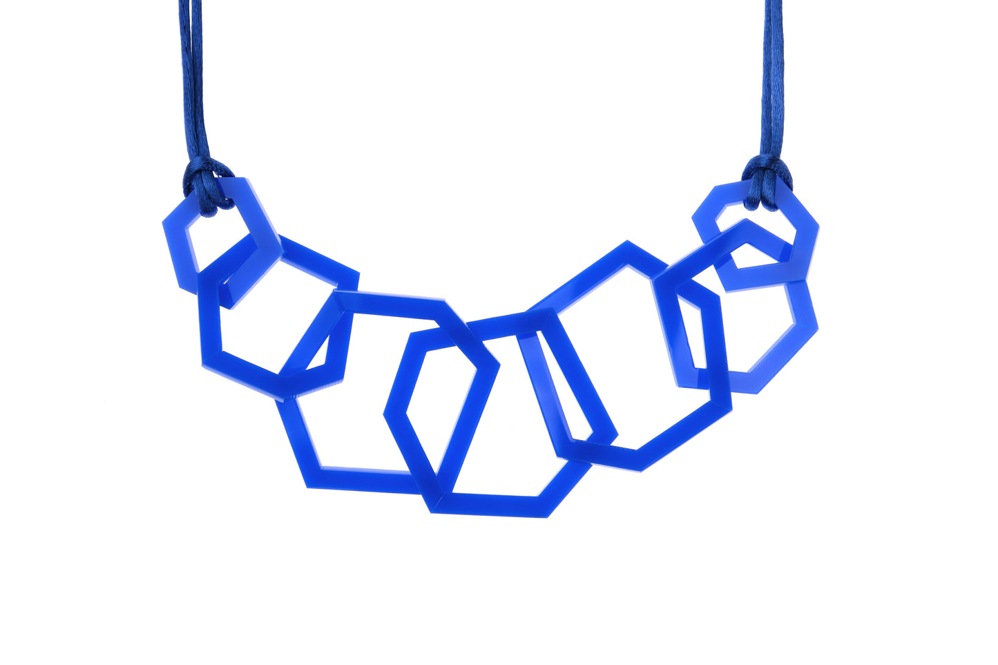Blue geometric necklace on a white background