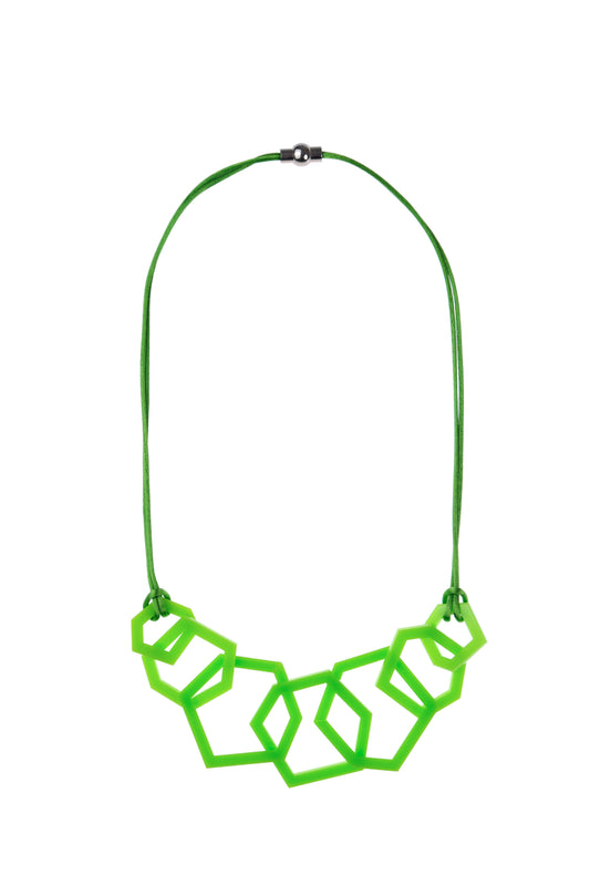 Lime green geometric acrylic necklace on a white background