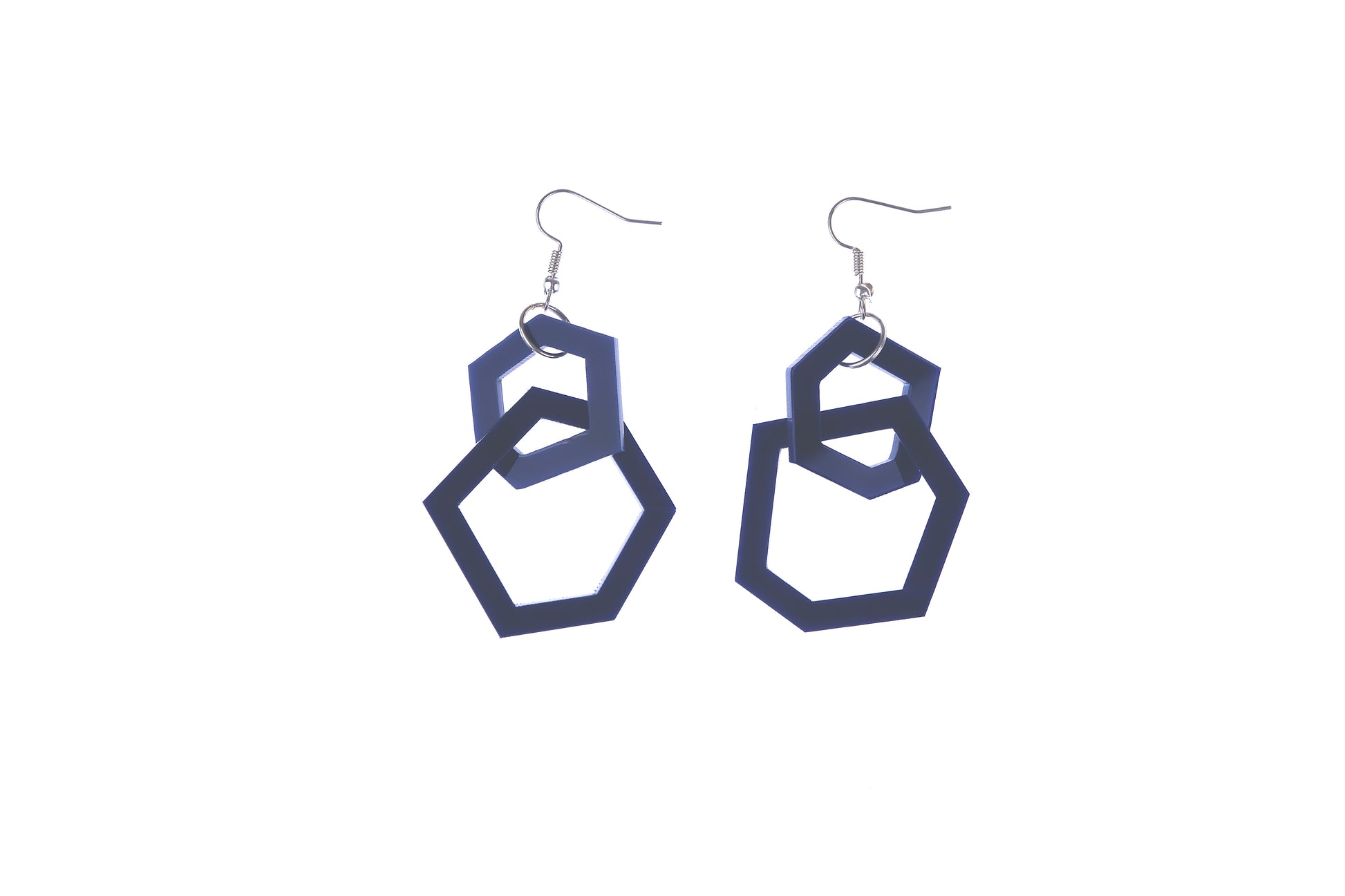 Navy blue geometric earrings on a white background