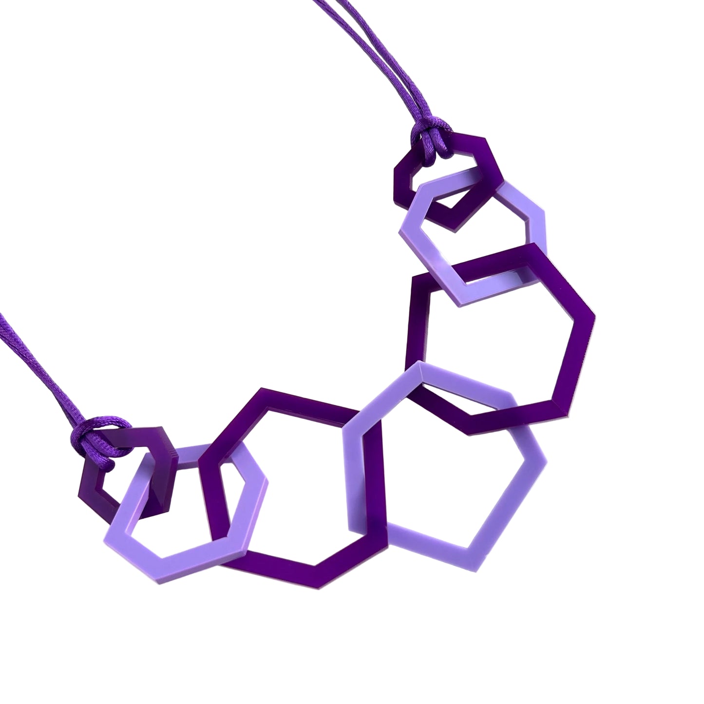 Purple and lavender geometric necklace on a white background