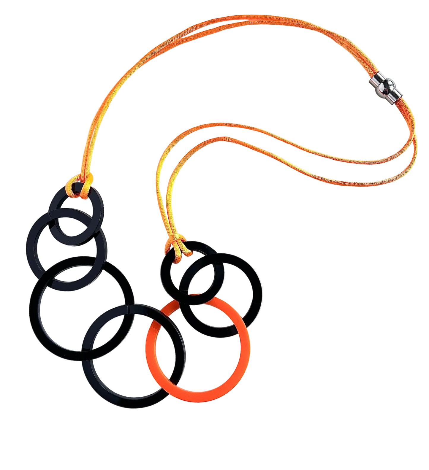 Necklace with black and orange rings on a white background
