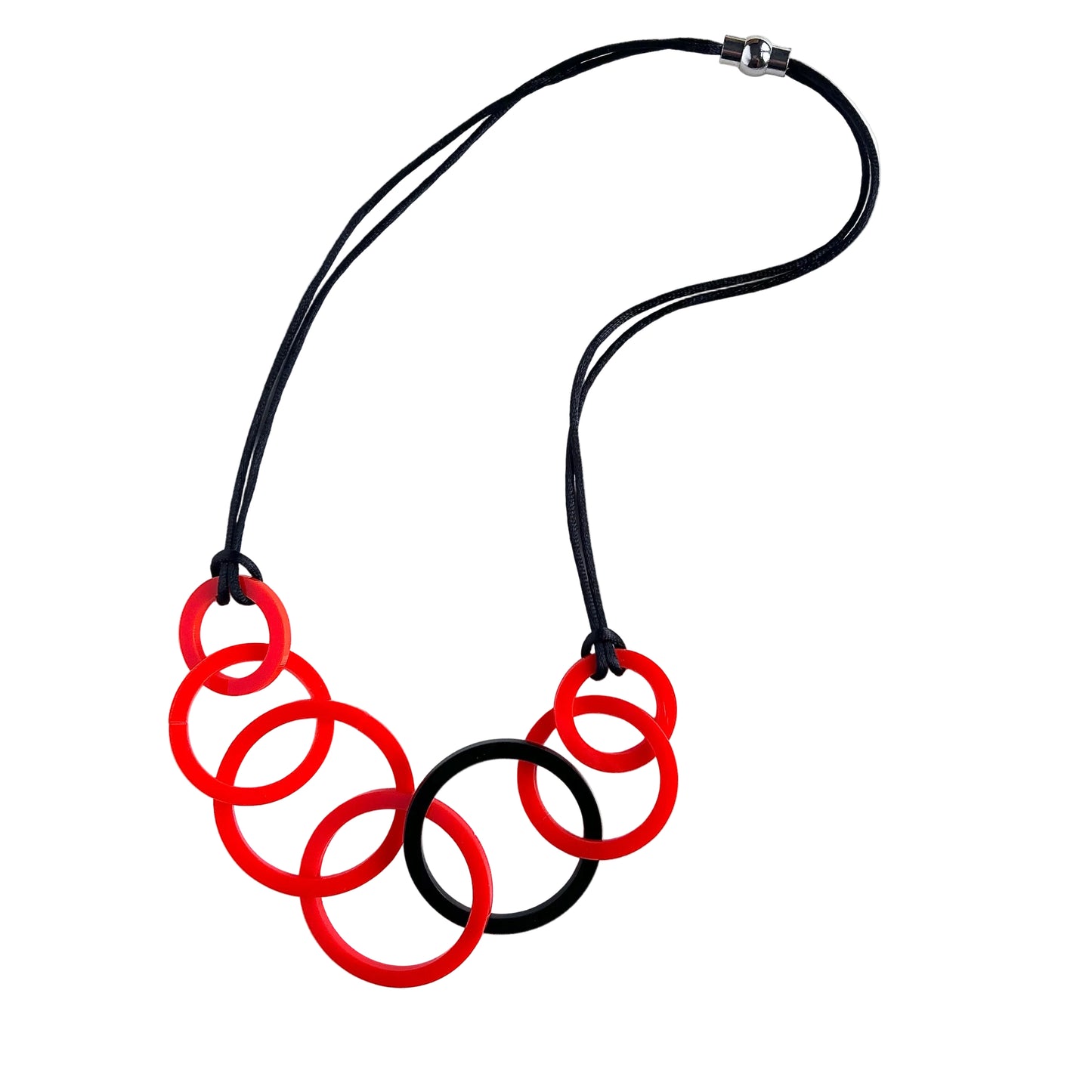 Necklace with red and black circular links on a white background