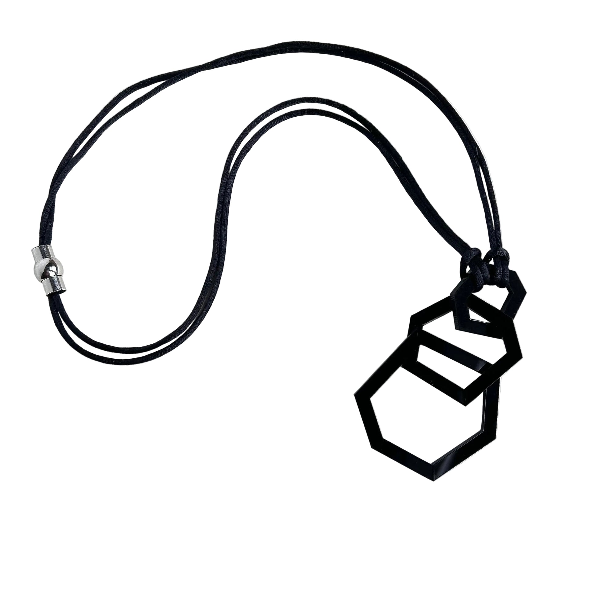 Black geometric necklace on a white background