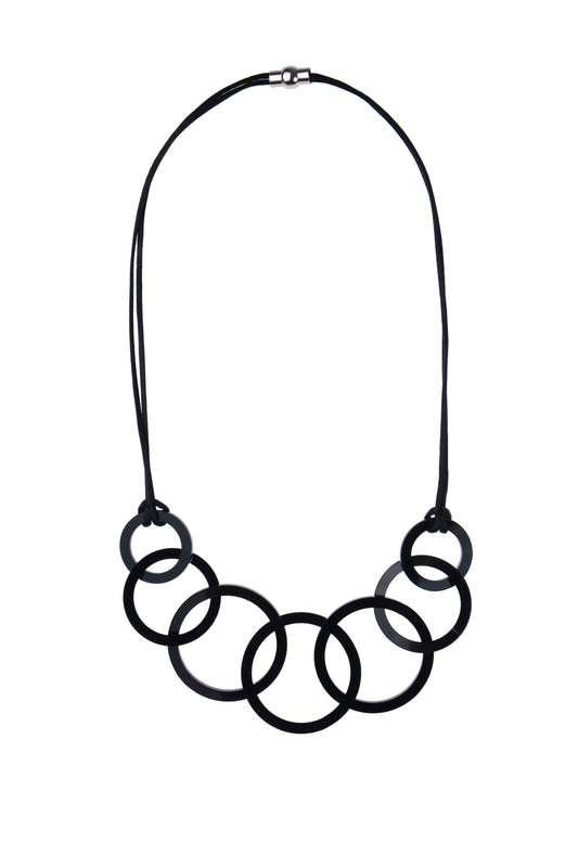 Black necklace with circular links on a white background