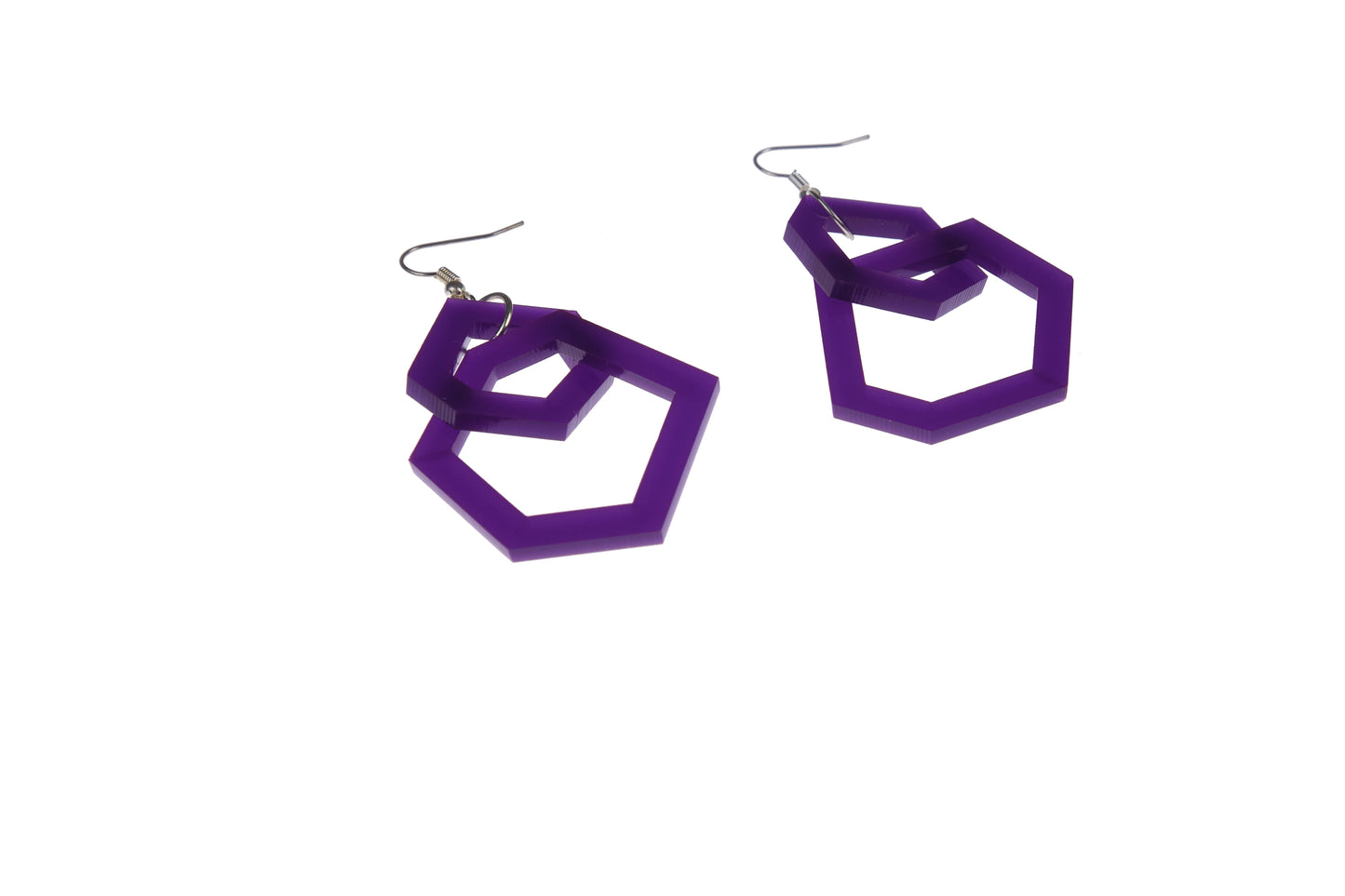 Purple geometric earrings on a white background
