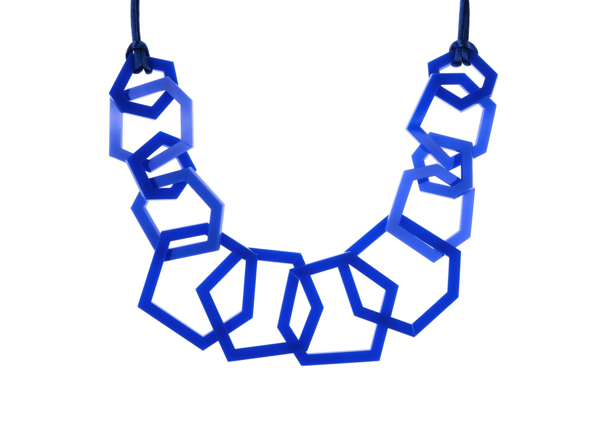 Royal Blue geometric necklace on a white background