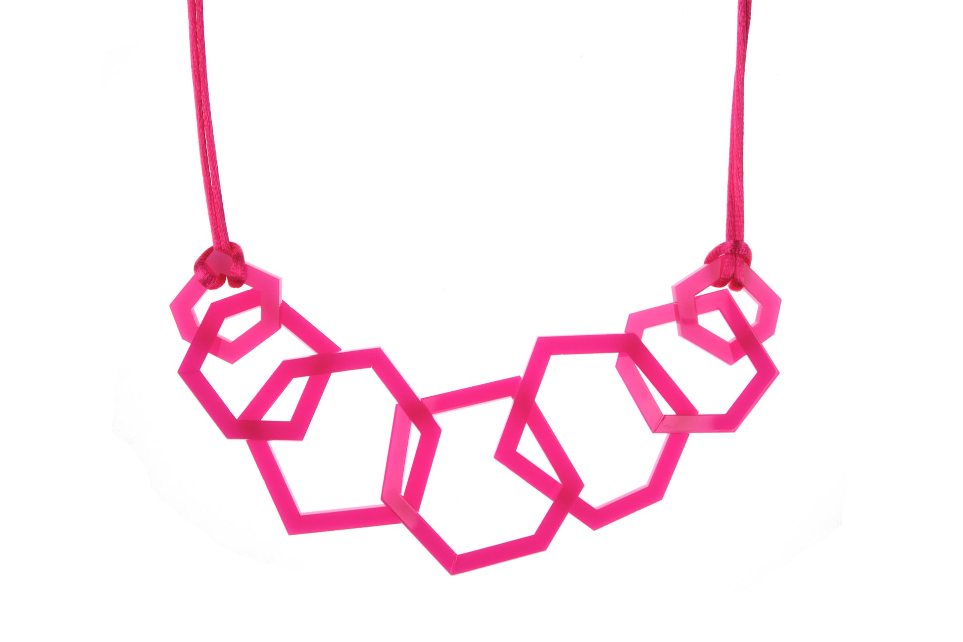 Fuchsia Pink geometric necklace on a white background