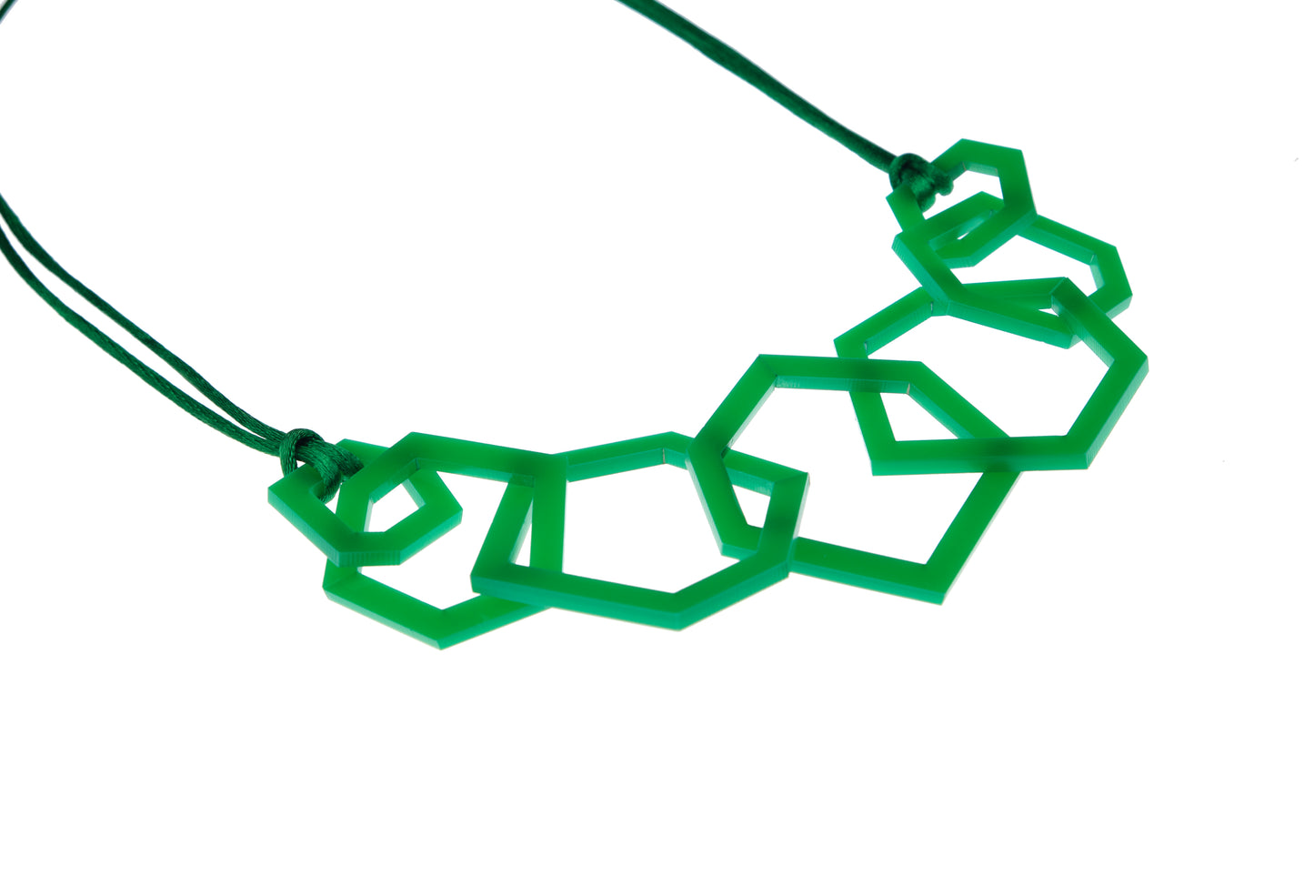 Emerald Green geometric necklace on a white background
