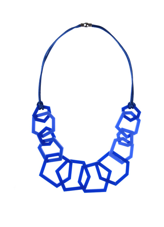 Royal Blue geometric necklace on a white background