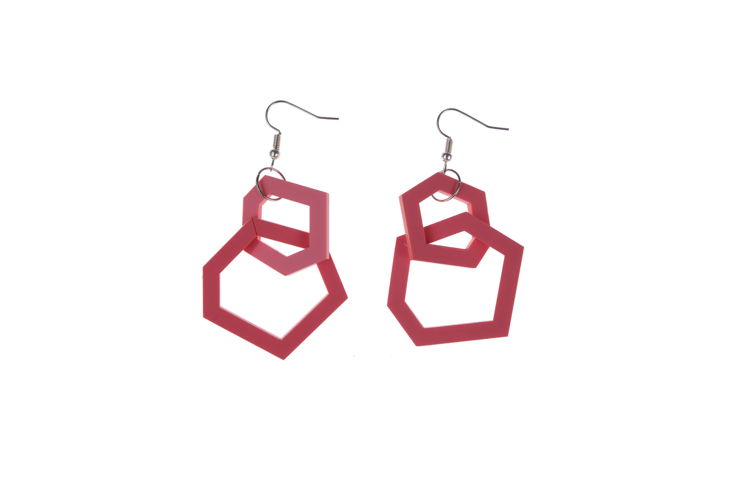 coral pink geometric earrings on a white background