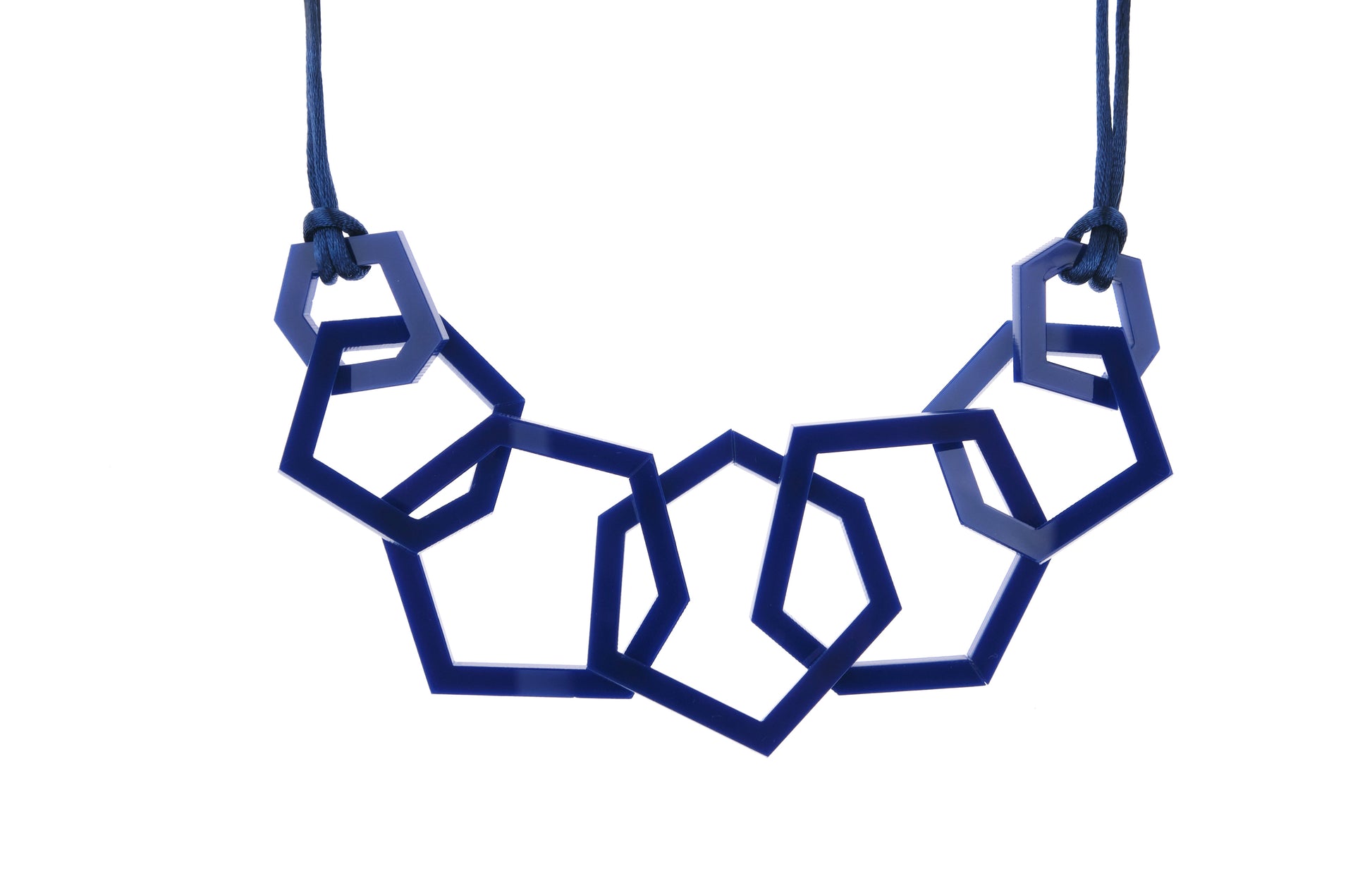 Navy Blue Geometric necklace on a white background